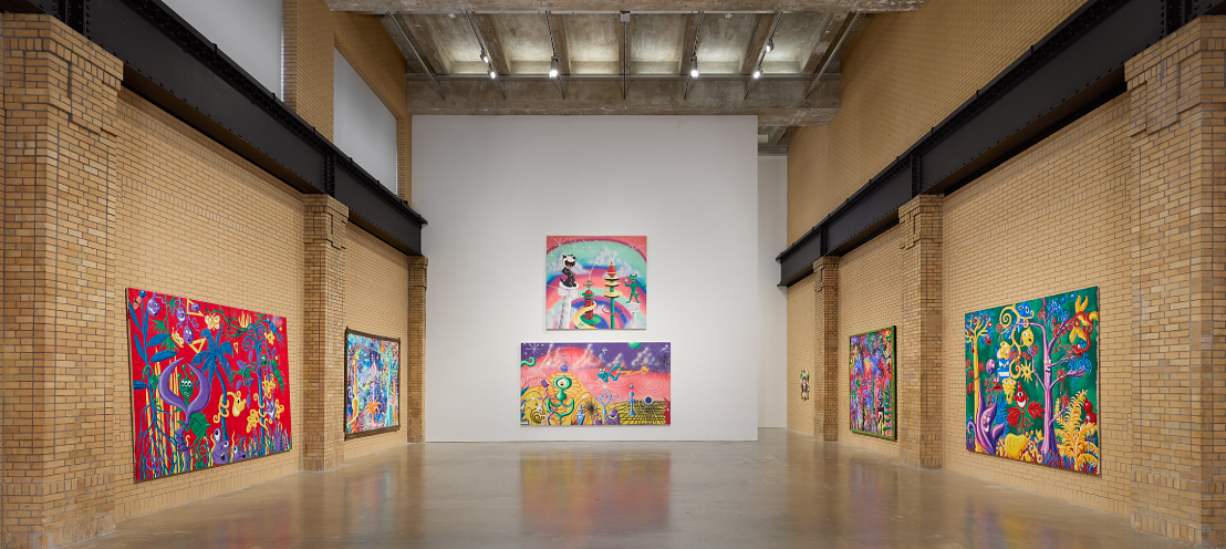 Multiple art pieces from Kenny Scharf Exhibition