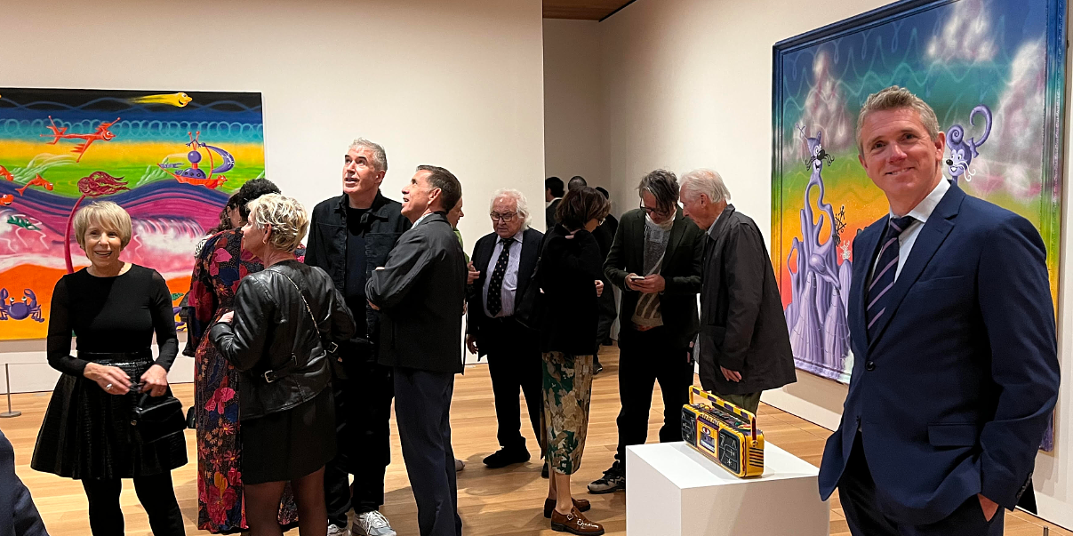 James Hendy, Crozier Senior Vice President at the Kenny Scharf Exhibition