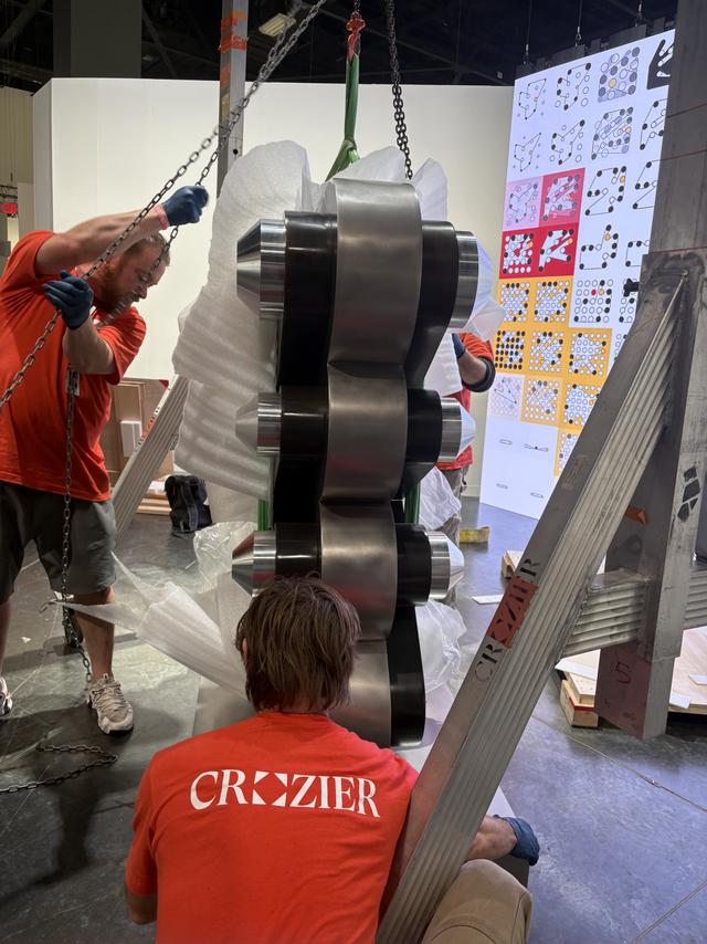 Crozier team installing sculpture 